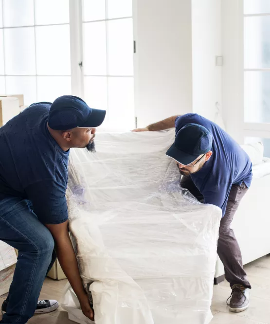 movers lifting furniture