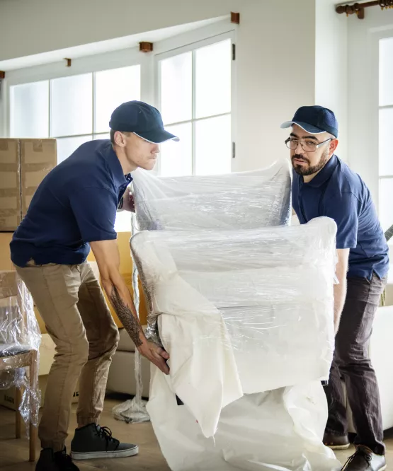 movers lifting furniture