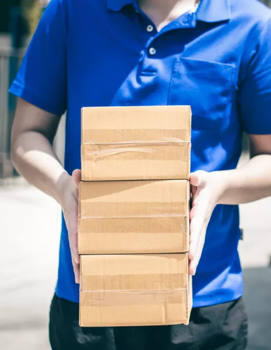 mover holding small boxes